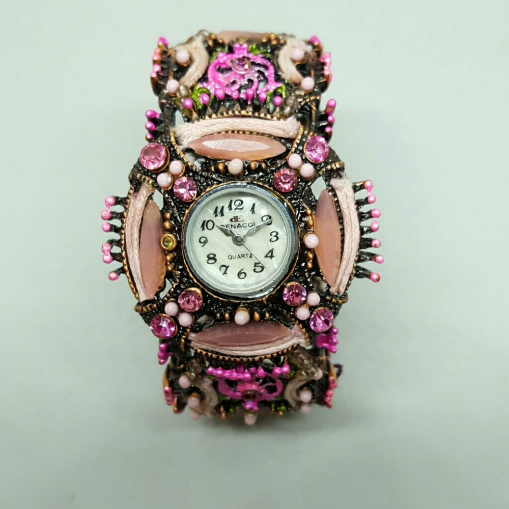Ornate pink bracelet watch by Denacci